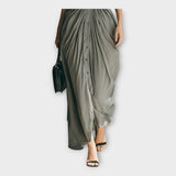 Pukamiso-kjole s tidløs elegance