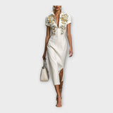 Kjole s raffineret broderi-detalje